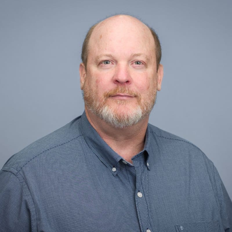 Man in blue checkered shirt